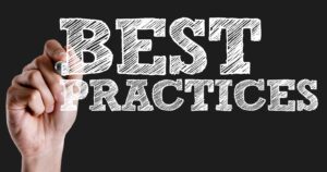 A hand drawing the words 'BEST PRACTICES' with a white marker on a black background, emphasizing the importance of best practices in planning for college.